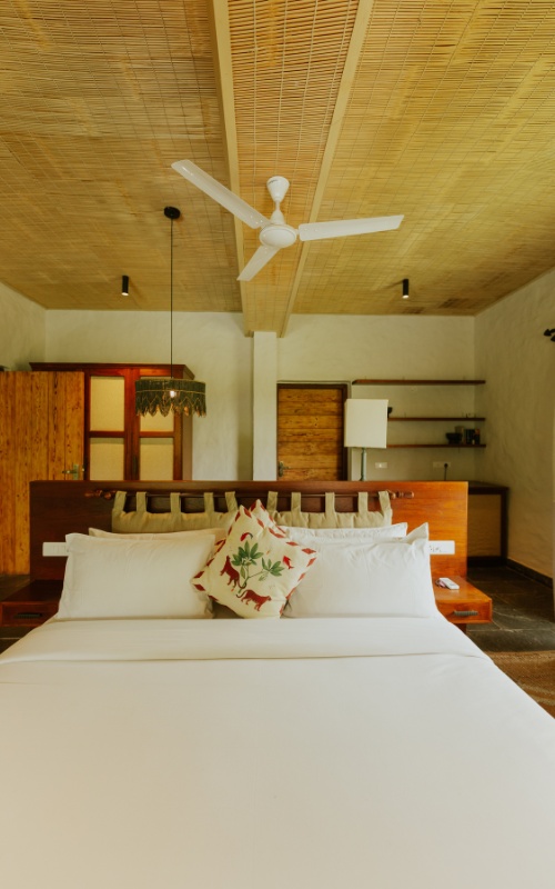 FHR Wilderness Lodge — bedroom ceiling fan detail with pendant lights